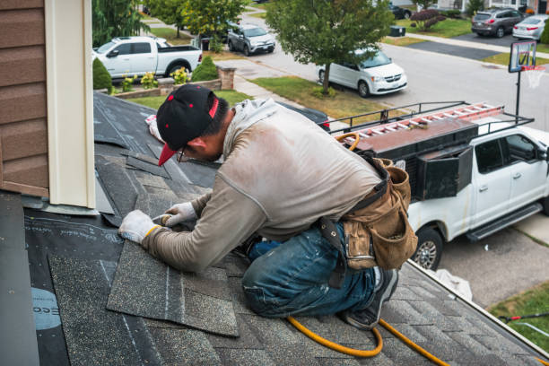 Professional Roofing technician working in New London, MN